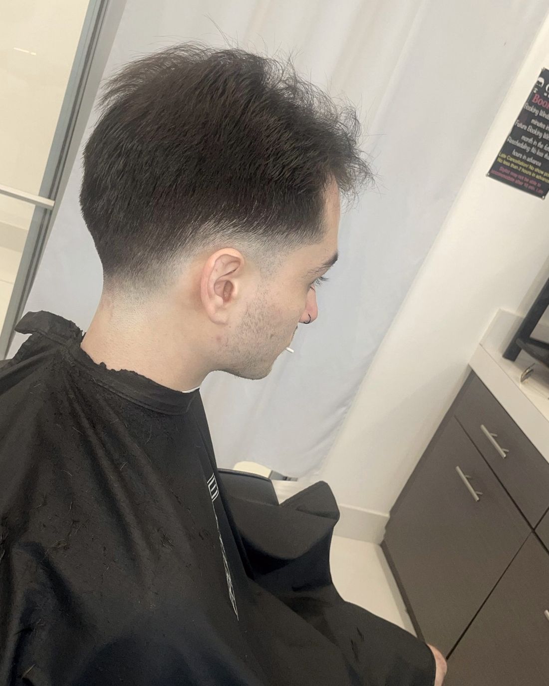 Low fade with a short textured top